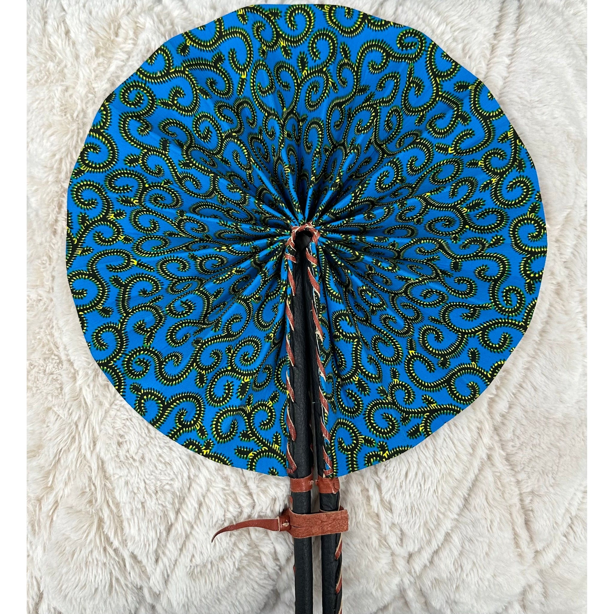 Aqua and yellow spiral African print folding fan