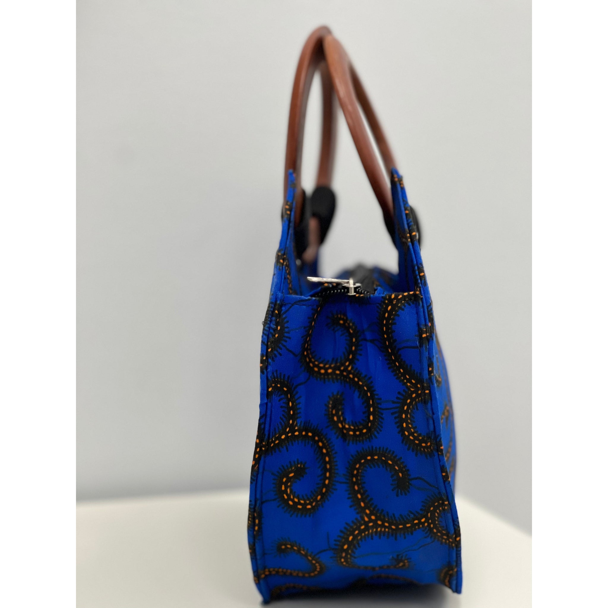 Blue and Orange African print handbag with wooden handle and fan
