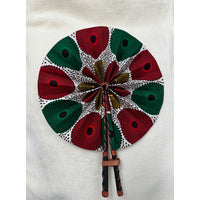 Red, green and yellow African print folding fan