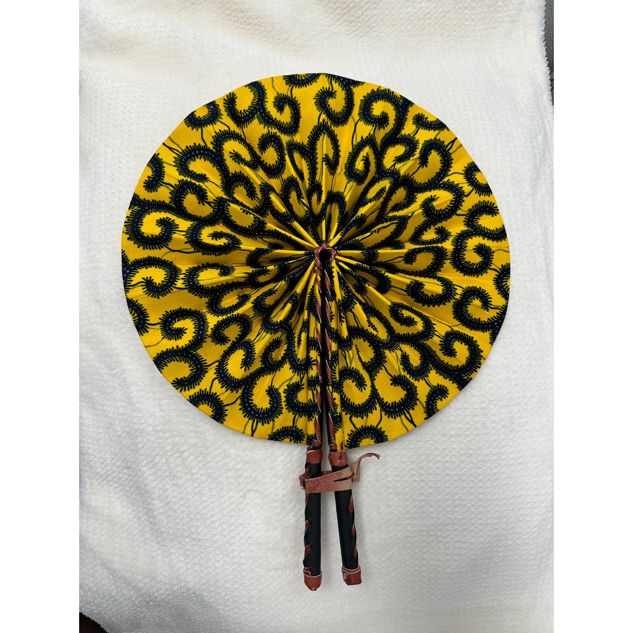 Yellow and blue African print cloth folding fan