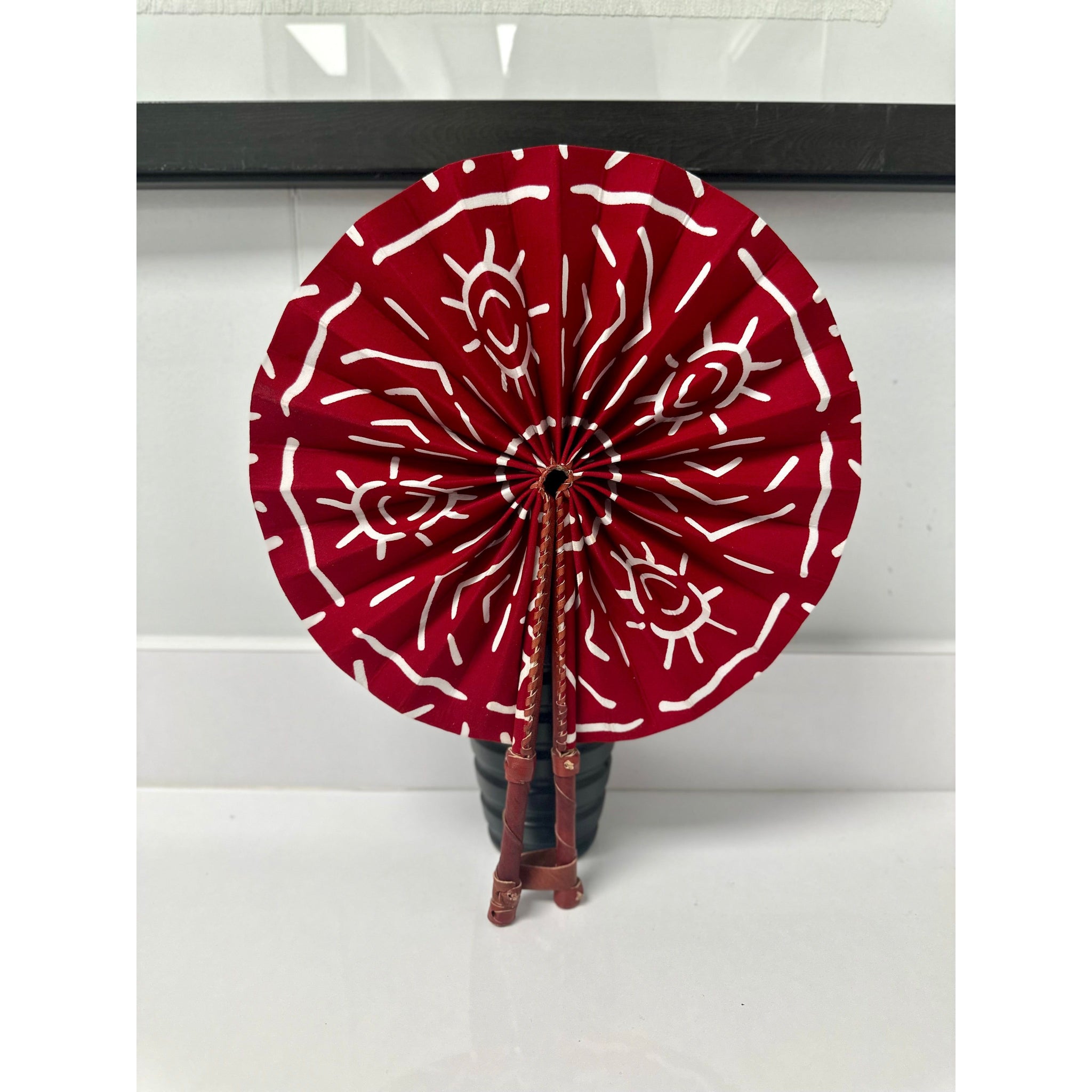Red and white mud cloth African print folding fan