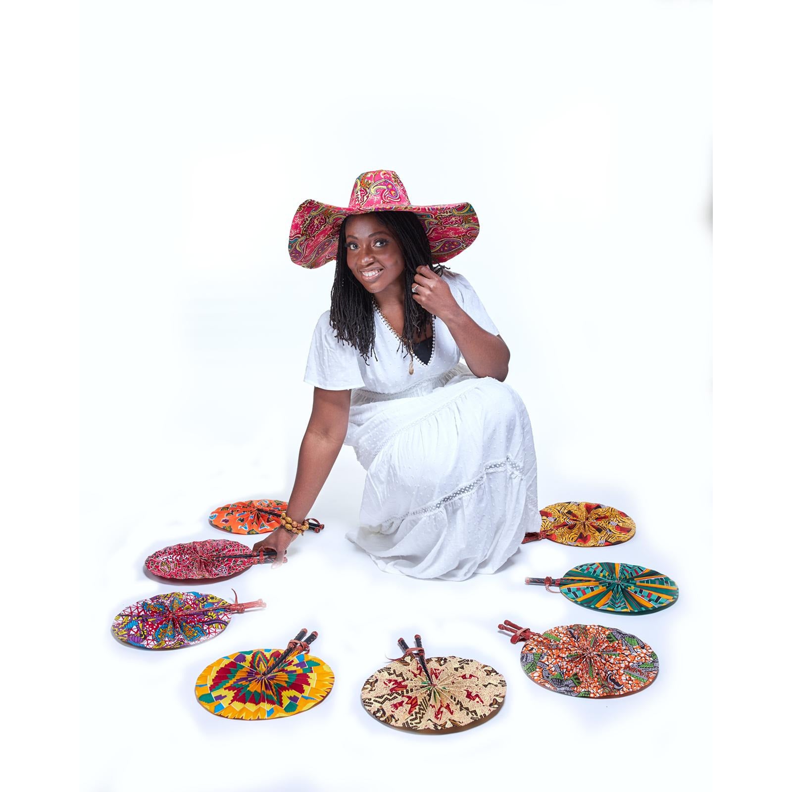 Blue and yellow African print folding cloth fan