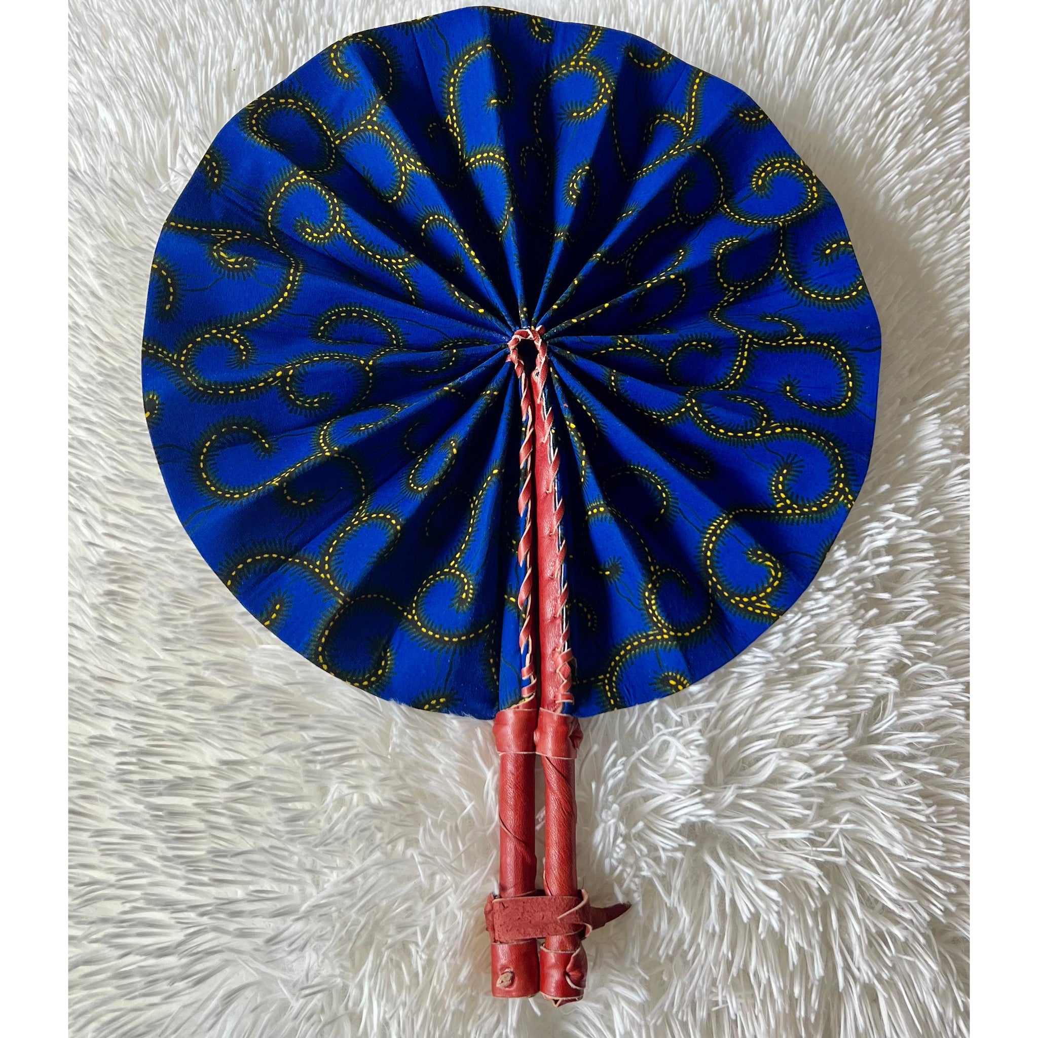 Blue and yellow African print folding cloth fan