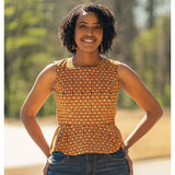 This beautiful orange print top is perfect for all occasions. Add any formal or casual bottom.   Description   Sleeveless  100% African wax cotton Lined Back zipper Hook and eye Length from nape to Flare is 24 inches Care instructions  We advise following our recommended care instructions in order to get the best out of your unique print clothes.  Hand wash with mild soap Do not bleach Hang to dry  Iron with cotton setting 