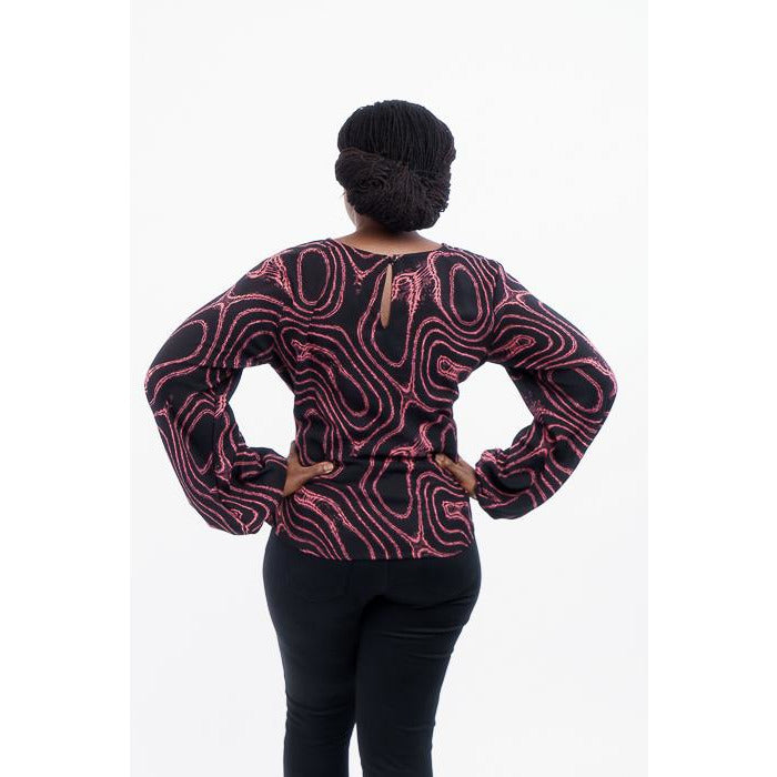 Pink and black print crepe top with bishop sleeves