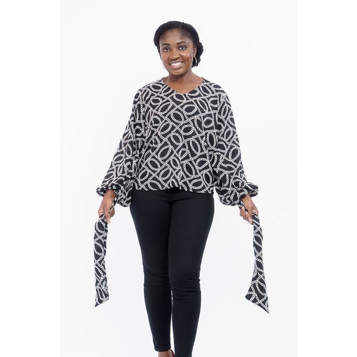 Pink and black print crepe top with bishop sleeves